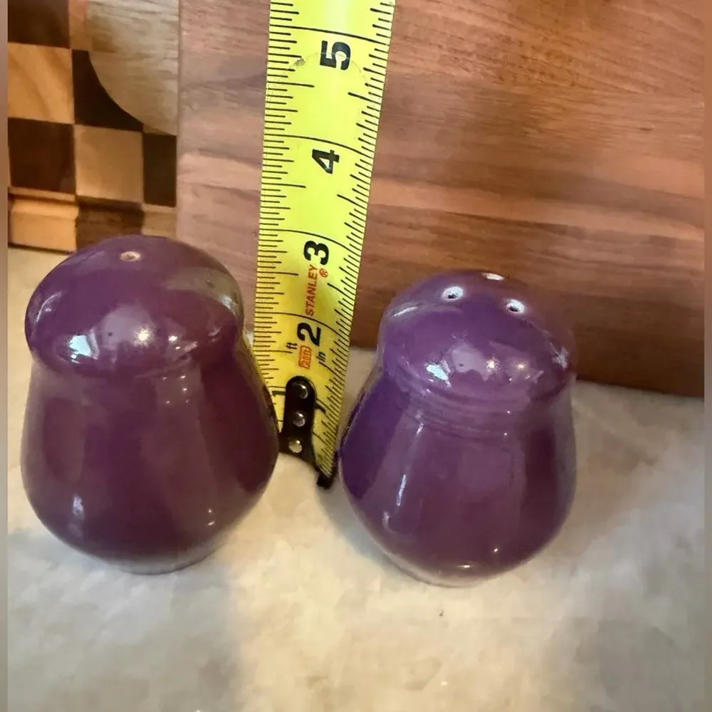 Vintage purple salt and pepper shakers